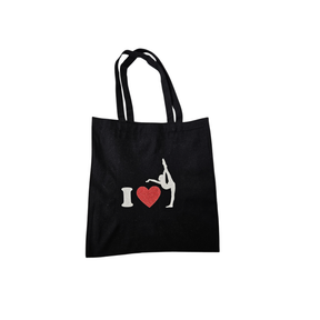 תיק קאנבס שחור עם סילואט מתעמלת ולב